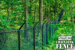 6 Foot High System21 Black Chain-Link Fence and 1 Foot High Barb Wire
