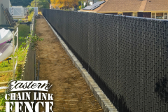 6 Foot High System21 Chain-Link Fence With Black Wing Slats