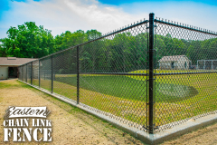 6 Foot High System21 Industrial Black Chain-Link Fence With Mid-Rail and Truss Rod