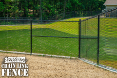 6 Foot High System21 Industrial Black Chain-Link Fence With Mid-Rail and Truss Rod