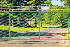 6 Foot High and 1 Foot Barb Wire All Green Eastern Internal Slide Gate